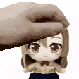 a hand is holding a doll 's head in a pixel art .