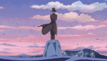 a man in a top hat is standing on top of a large rock