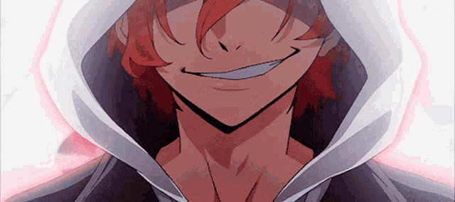 a close up of a person with red hair wearing a white hoodie