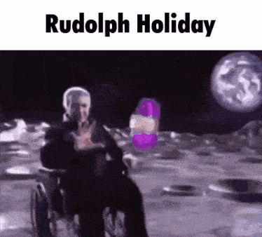 a man in a wheelchair is standing on the moon holding a purple object .