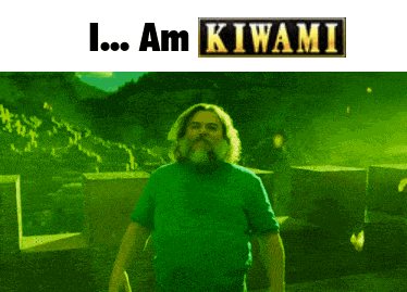 a man in a green shirt is standing in front of a sign that says i am kiwami