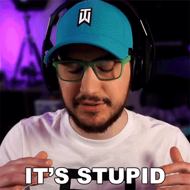 a man wearing a blue hat and glasses says it 's stupid