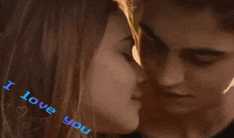 a man and a woman are kissing with the words i love you on the bottom