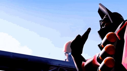 a man in a hard hat looks up at a robot