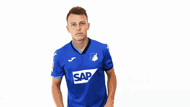 a man is wearing a blue shirt with the word sap on it