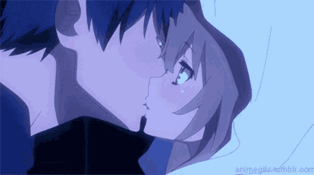 a boy and a girl are kissing in a purple anime scene .