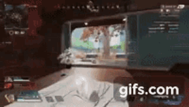 a person is playing a video game in a room with a projector screen .