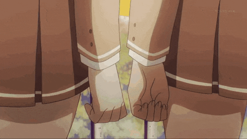 two girls holding hands with tokyo mx written on the bottom left