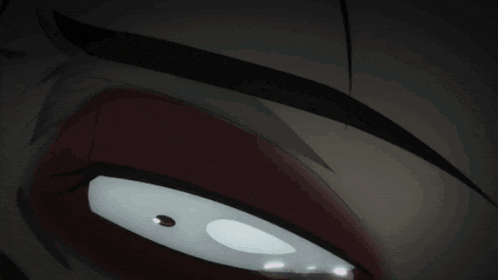 a close up of a person 's eye with blood dripping from it