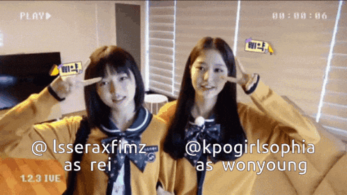 two girls in school uniforms are posing for a picture with their hands to their ears and the caption says " as rei "