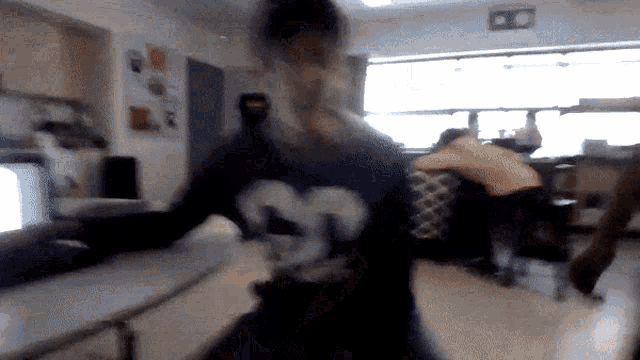 a blurry photo of a person wearing a jersey with the number 32