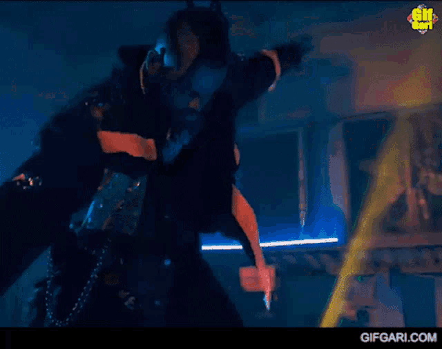 a gif of a person dancing with a gifgari.com logo on the bottom