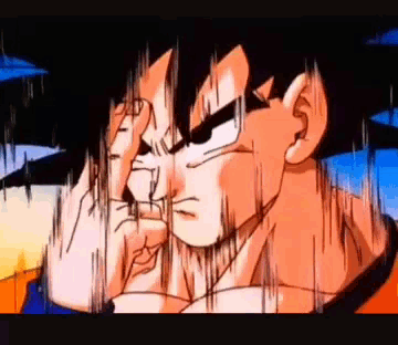 a close up of a dragon ball z character covering his face with his hands