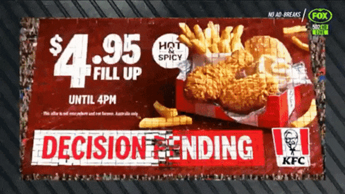 a kfc advertisement shows a box of hot spicy chicken and french fries