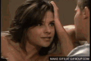 a man touching a woman 's forehead with a make gifs at gifsoup.com icon