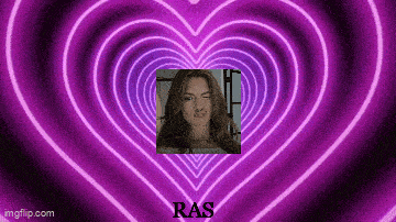 a purple heart with a picture of a woman in the middle .