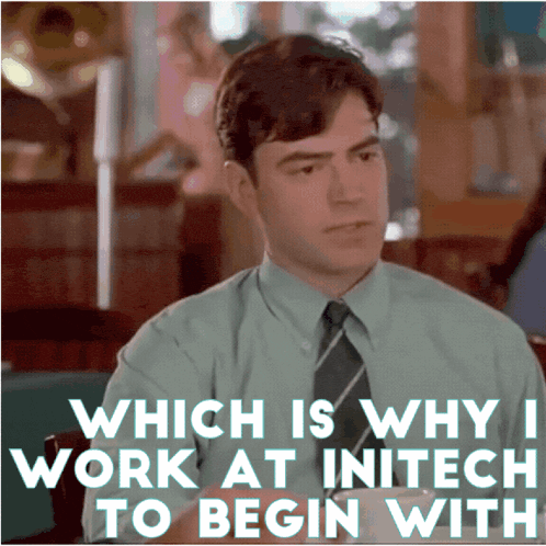 a man in a suit and tie is asking which is why he work at initech to begin with