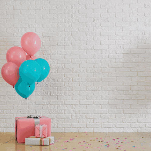 a cartoon character is dancing in front of a brick wall with the words feliz cumpleanos on it