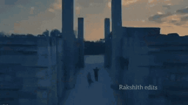a man and a woman standing next to each other with rakshith edits on the bottom right
