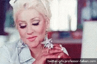 a gif of a woman with a twitter-gifs.professor-falken.com watermark at the bottom