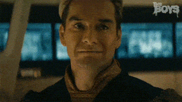 a close up of a man 's face with the words `` the boys '' on the bottom right .