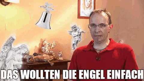 a man in a red shirt with the words das wollten die engel einfach on the bottom right