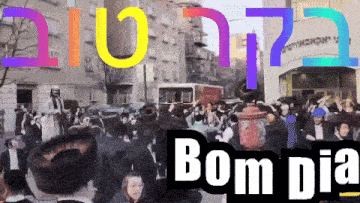 a crowd of people are gathered in front of a building with the words bom dia on it