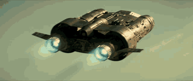 a space ship is flying through the air with two blue lights on the back of it