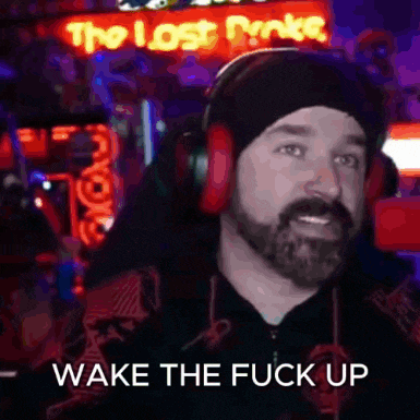 a man wearing headphones is standing in front of a neon sign that says the lost punk