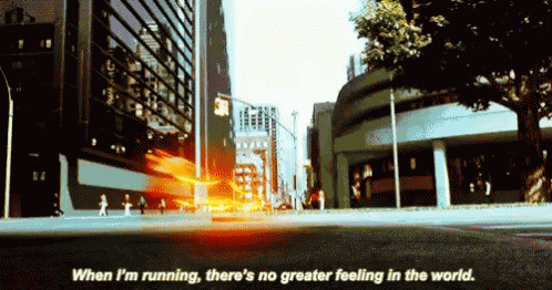 a city street scene with a quote that says when i 'm running there 's no greater feeling in the world