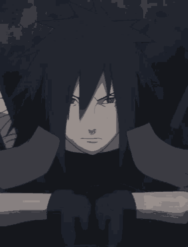 a close up of a naruto character 's face