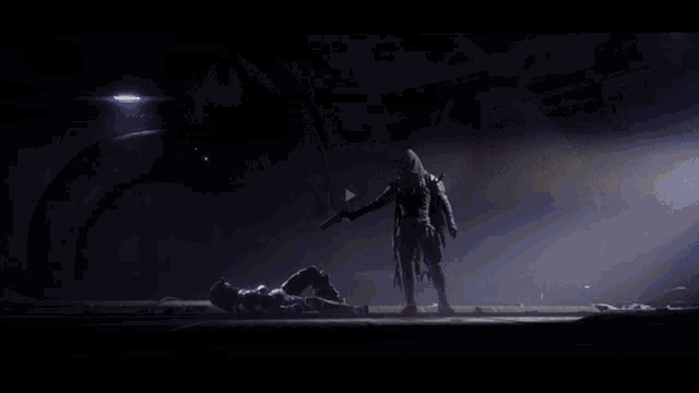 a person in a hood with glowing eyes is standing in the dark