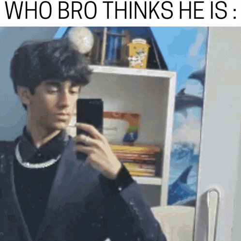 a young man is taking a selfie in front of a mirror with the caption `` who bro thinks he is '' .