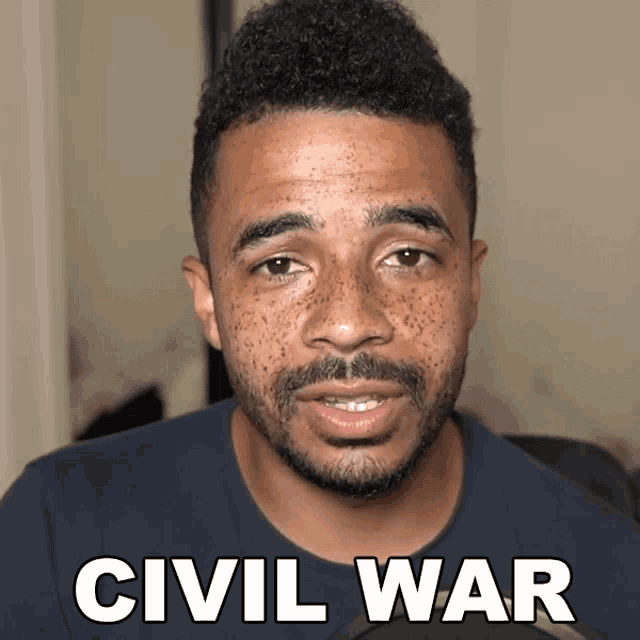 a man with a beard says civil war in white letters