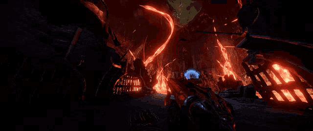 a person holding a gun in a dark room with fire coming out of the walls