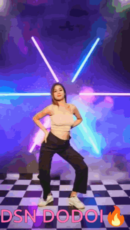 a woman is dancing on a checkered floor with the words dsn dodoi in the corner