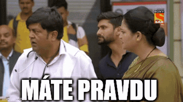 a man with a stethoscope around his neck is standing next to a woman with the words mate pravdu written above him