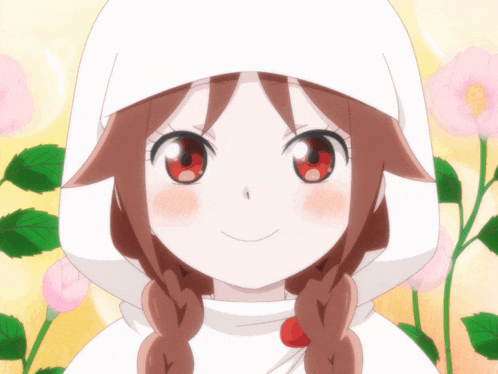 a girl with braids wearing a white hood is smiling
