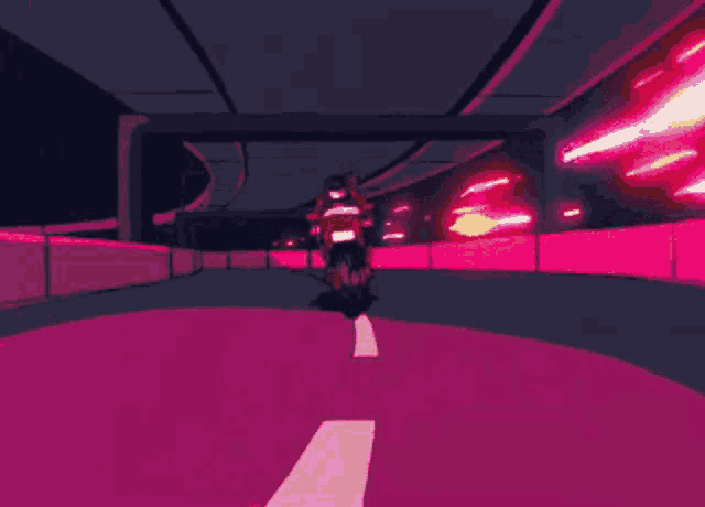 a person is riding a motorcycle on a purple road