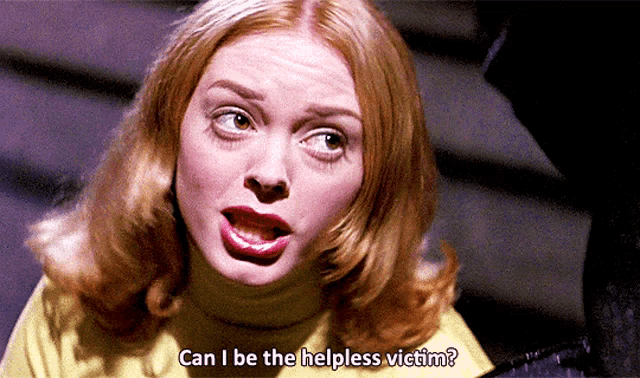 a woman in a yellow sweater says " can i be the helpless victim ? "