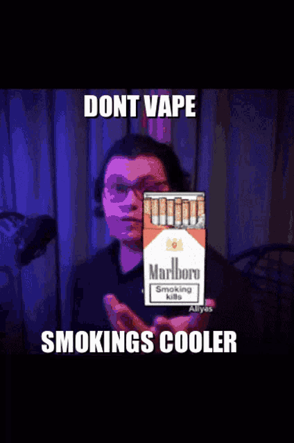 a man is holding a pack of marlboro cigarettes and says " dont vape smokings cooler "