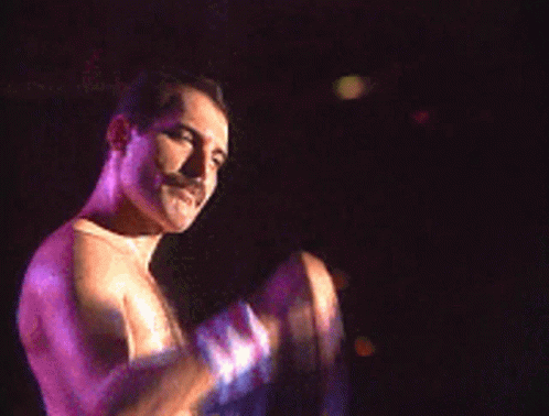 Freddie Mercury 80s GIF - Freddie Mercury 80s Raise Hand GIFs