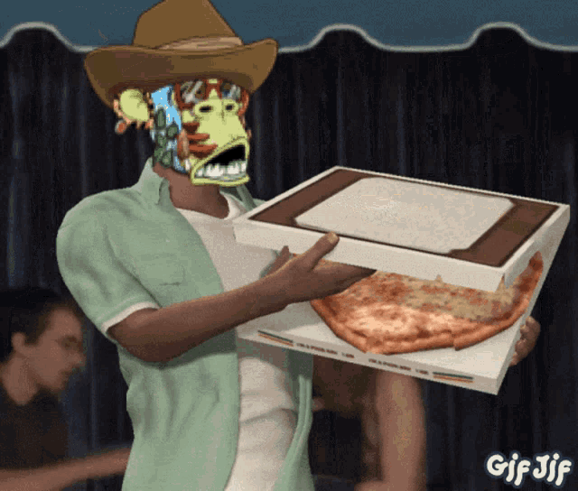a man in a cowboy hat is holding a box of pizza with gif jif written on the bottom