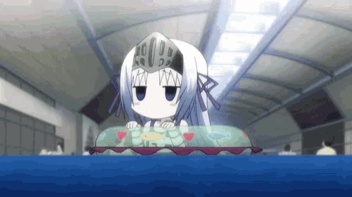 a little girl with a crown on her head sits on a float