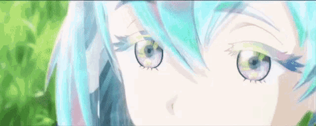 a close up of a girl 's eyes with blue hair and purple eyelashes .