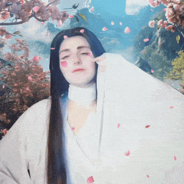 a woman in a white kimono with pink petals on her face
