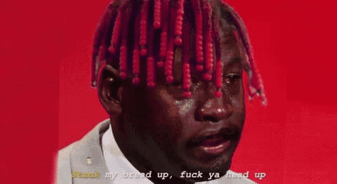 a man with pink hair is crying and says track my brand up