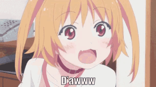 a girl with pigtails is making a funny face and says d' awww .