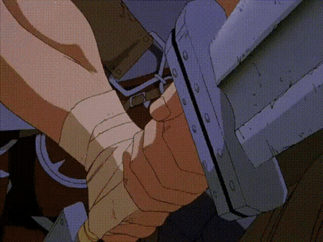 a close up of a person holding a sword in their hands