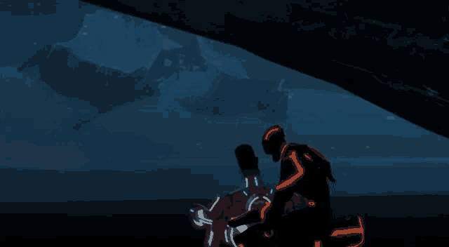 a man in a neon suit is riding a motorcycle